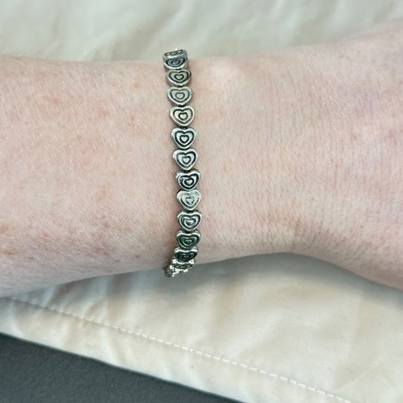 2/$15 Silver tone stretchy bracelet w/carved Heart beads all the way around - Picture 8 of 13